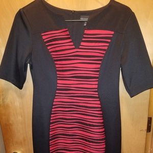 Ladies used fitted black and red dress. Biz length